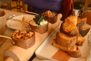 Photo of several dishes from a restaurant in Chelsea Market.