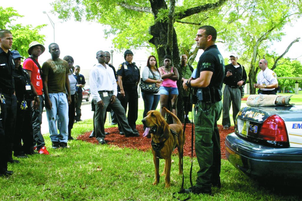 Officer Nelson Enriquez with his K-9 partner Jimmy.