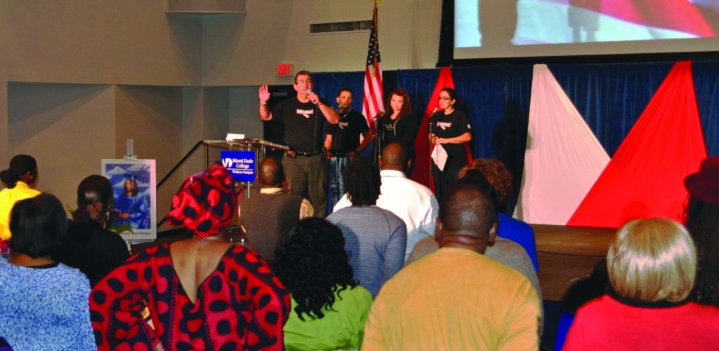 Gospel singers performing on stage.
