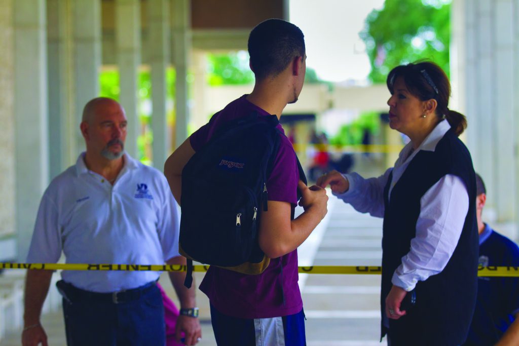 Student being directed away from building 2.