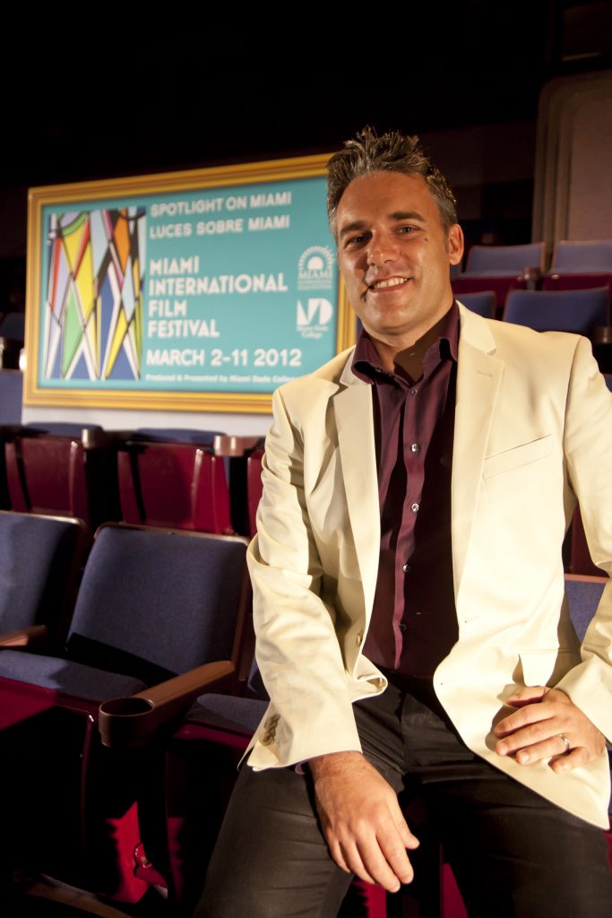 MIFF Director Jaie Laplante with the official poster.