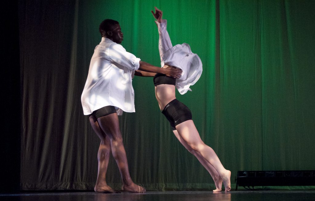 Students performing on stage.