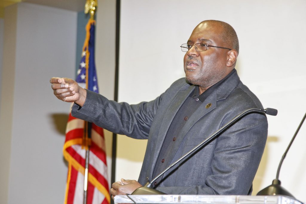 Journalist Selwyn Crawford speaking to students.