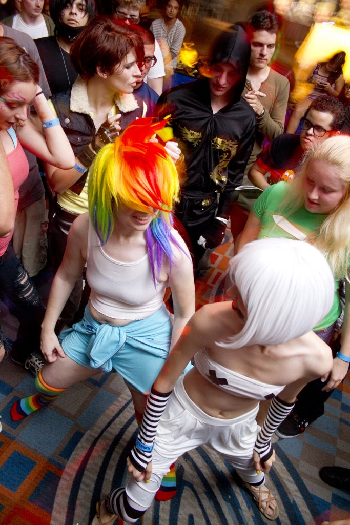 A couple of girls dancing at the Florida Supercon.