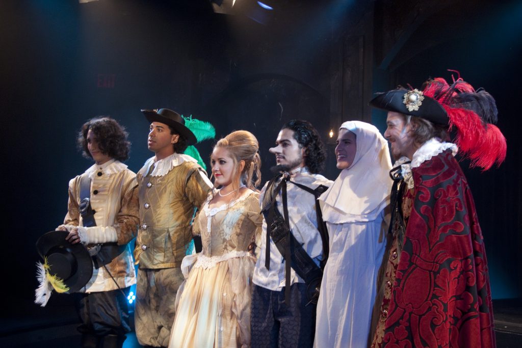 The actors take a bow after their performance.