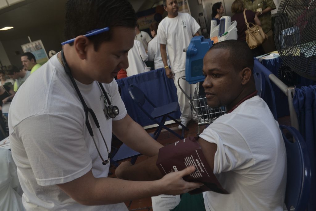 Nursing student taking Fontaine's blood pressure.