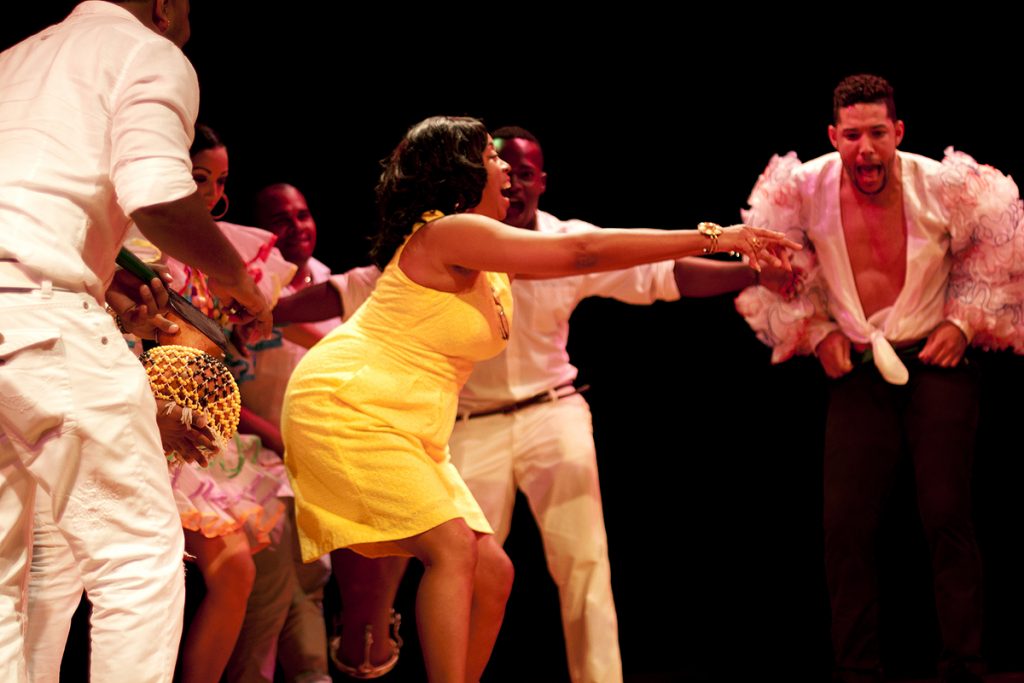 Students performing with their choreographer.