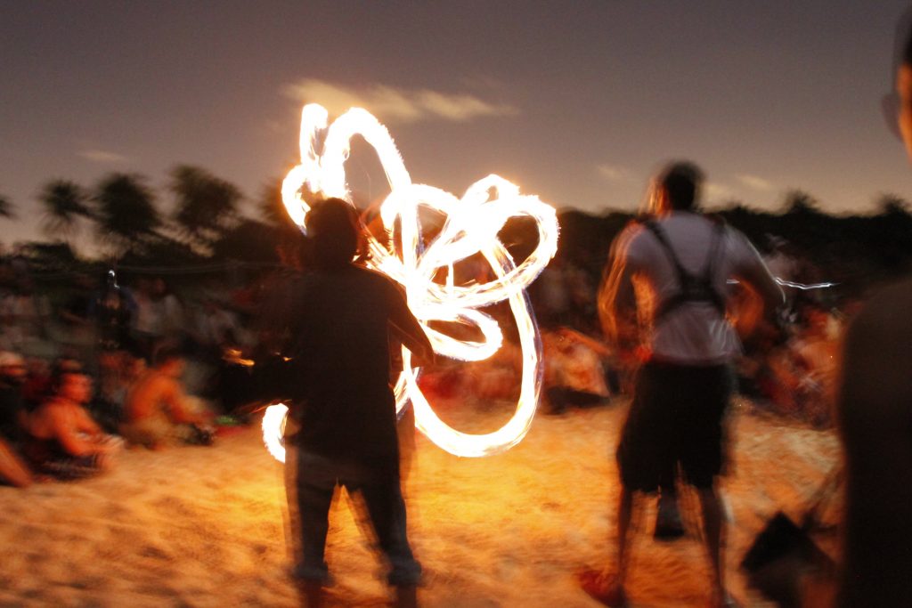 People performing in the Full Moon Drum Circle.