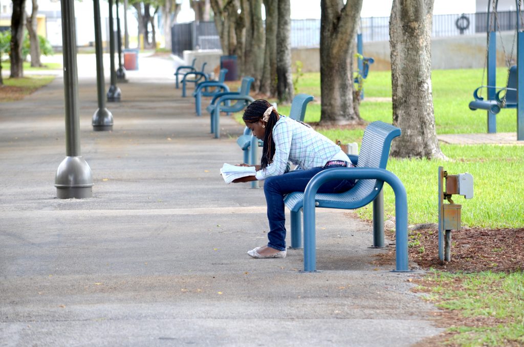 Student studying outdoors.