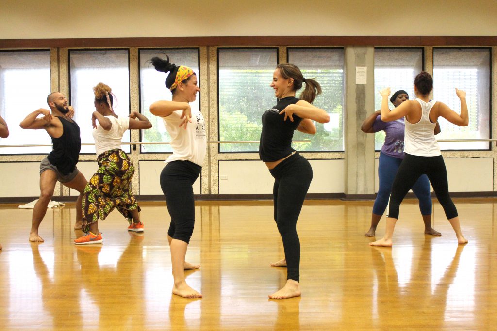 Dancing students warming up.