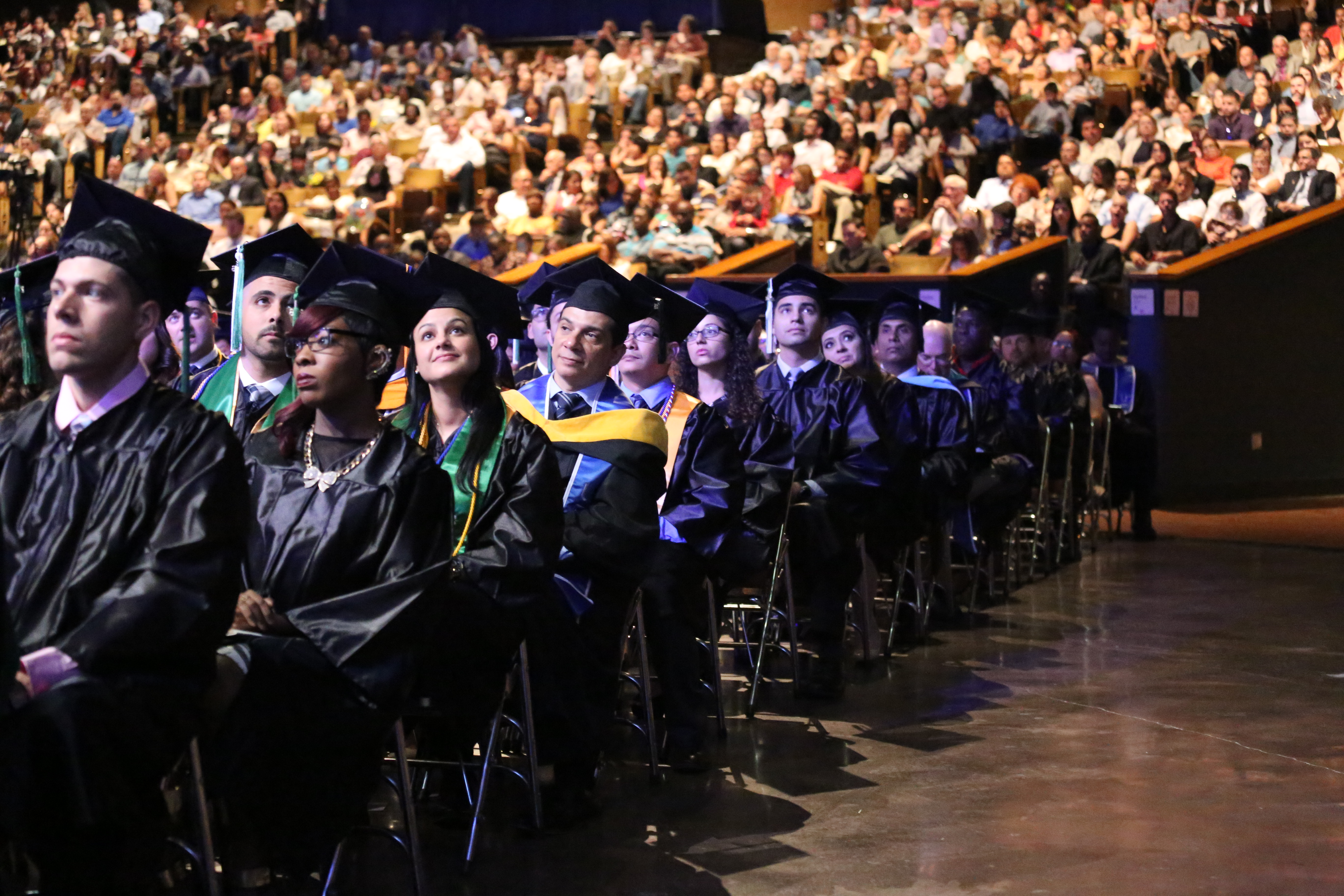 Medical Campus students waiting and listening during graduation.