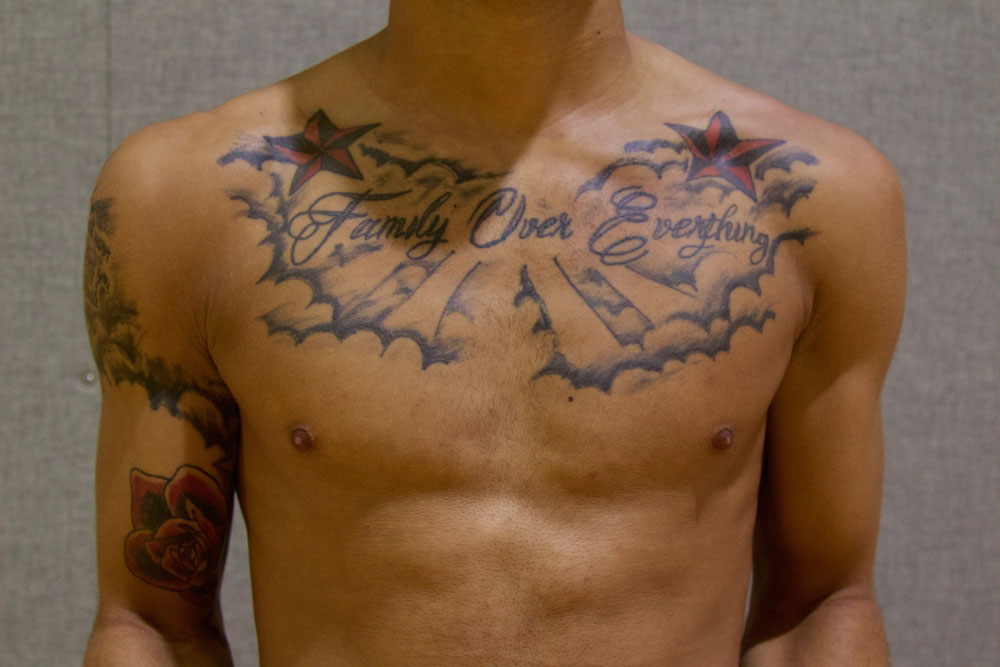 Chest tattoo.