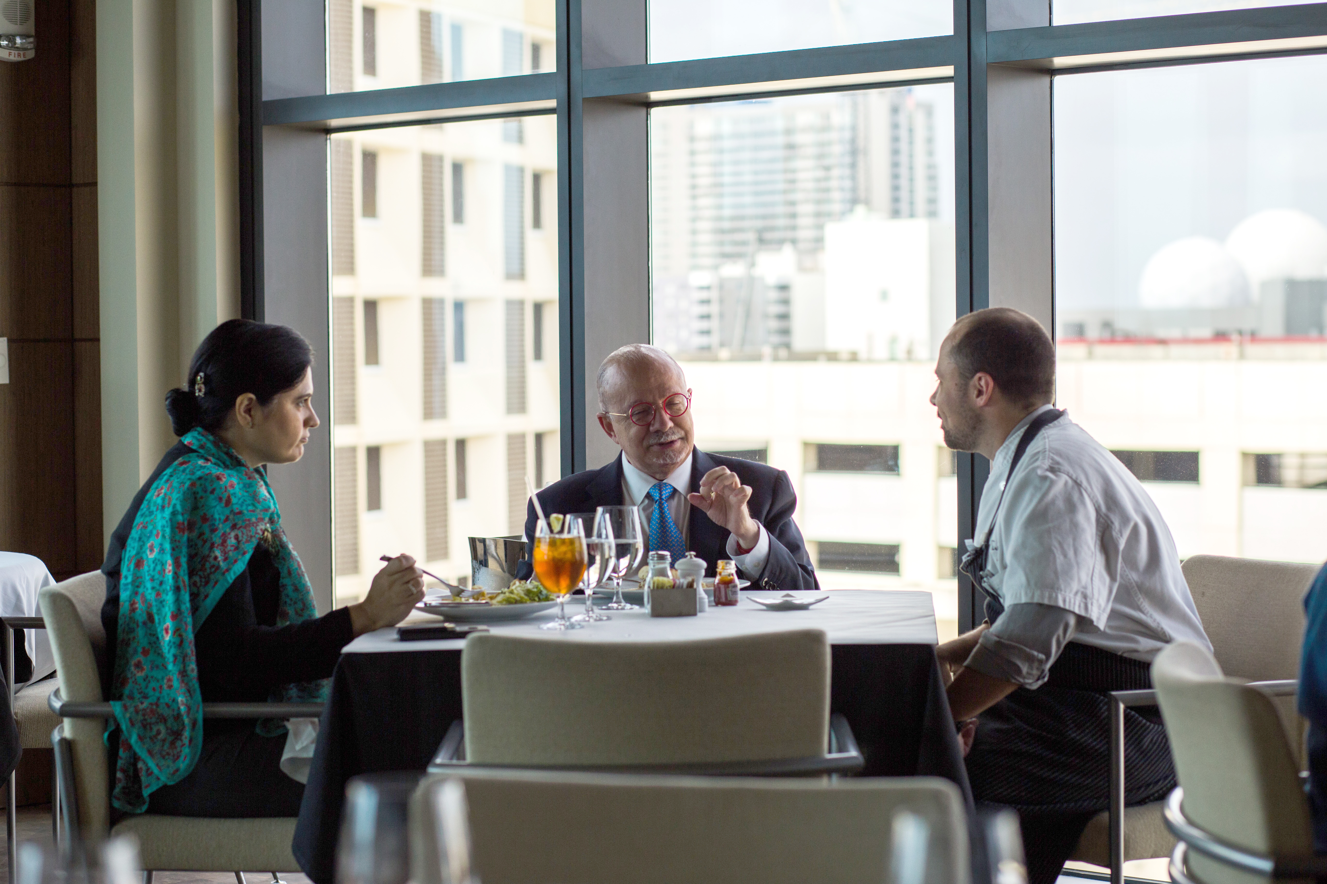 College President Eduardo Padron trying out the new dishes.