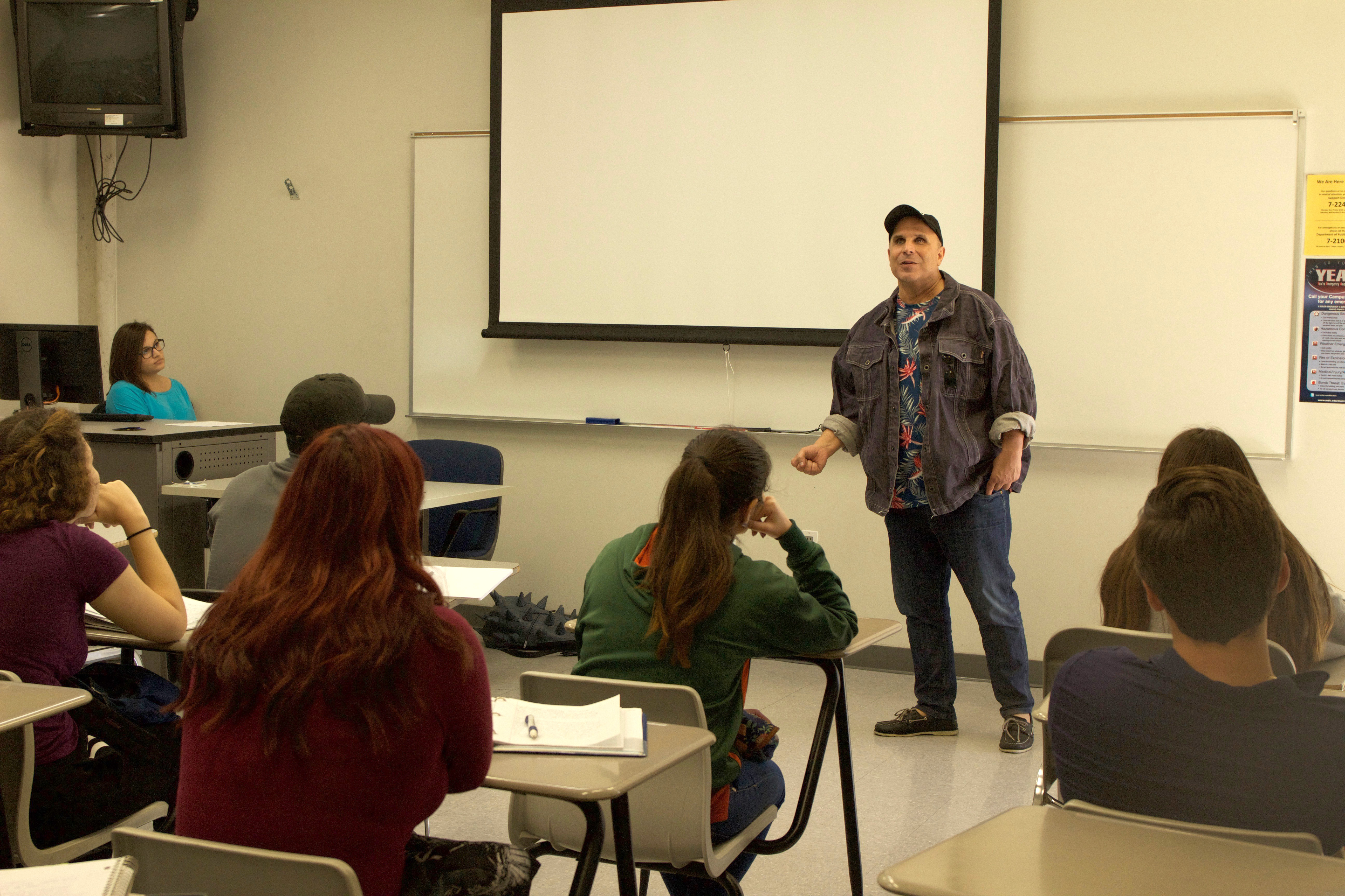 English professor Manuel Duasso giving a lecture.