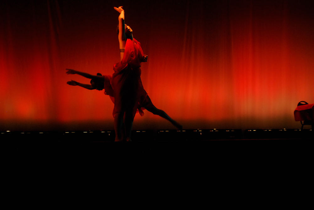 Dancer performing on stage.