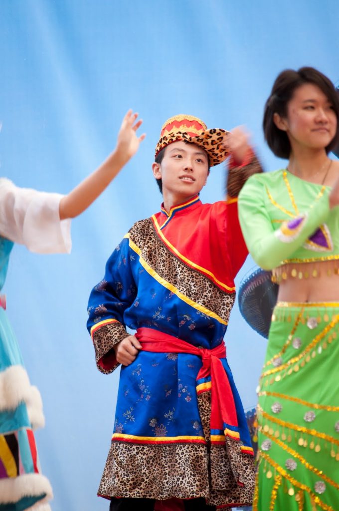 Student performing on stage.