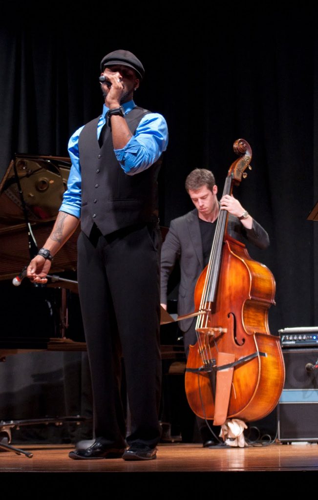 Faculty performing on stage at Kendall Campus.