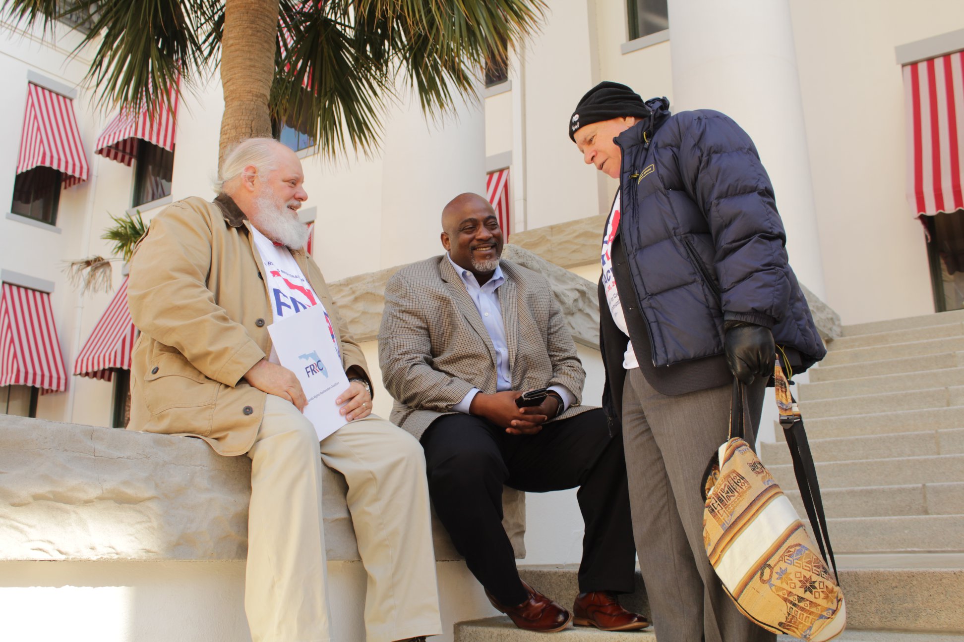 Meade outside the Florida Capitol speaking to 