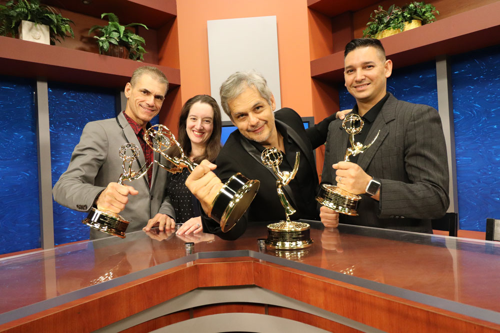 The people behind MDC-TV posing with their awards.