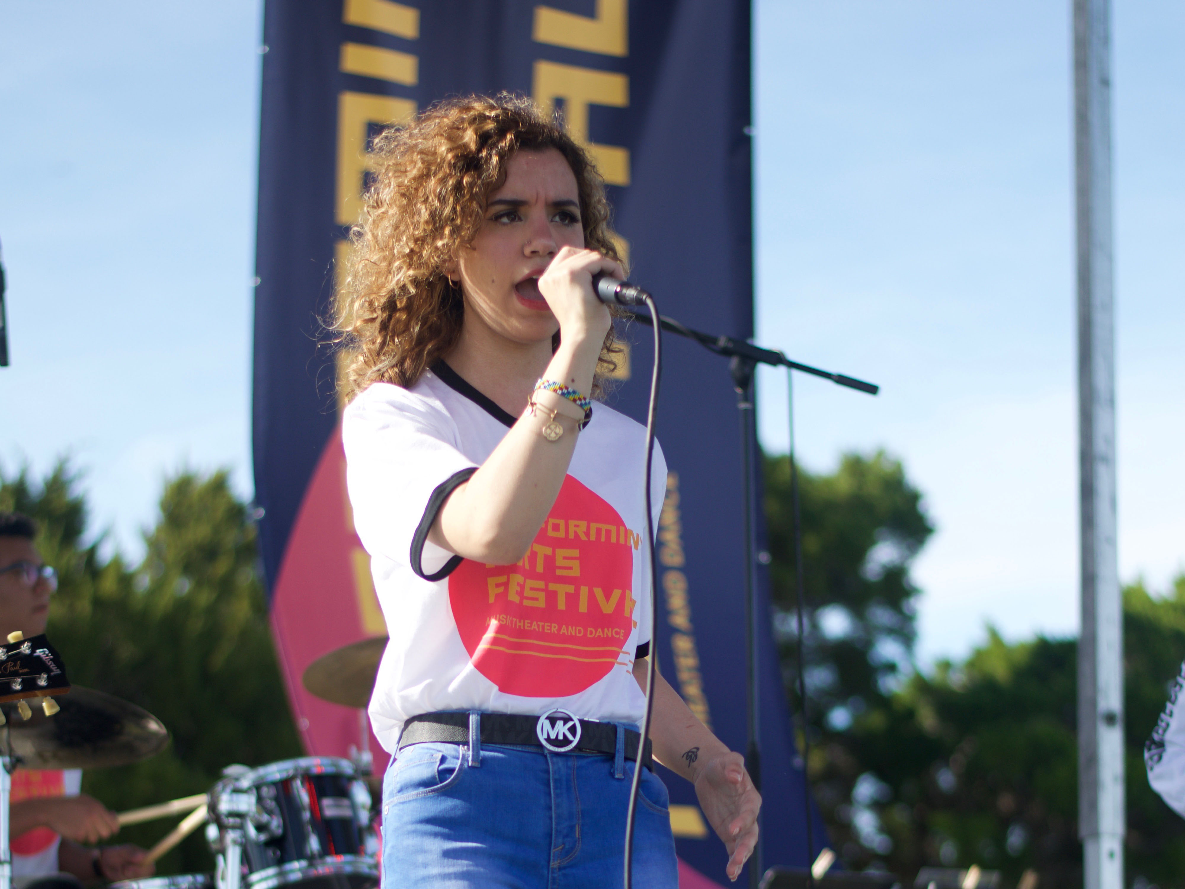 Paige performing on stage.