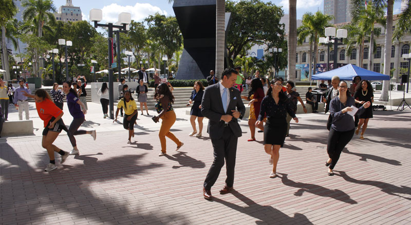 Students, faculty and staff dancing during a flash mob.