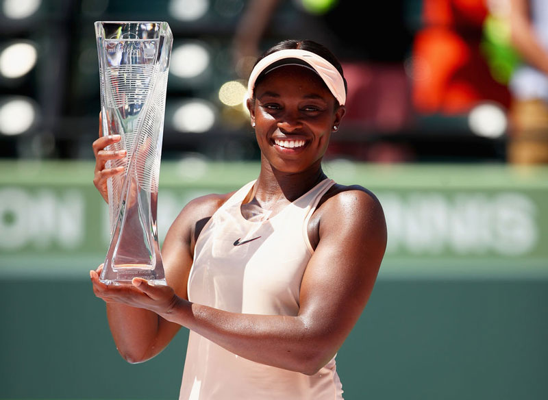 Sloane Stephens holding up her trophy.
