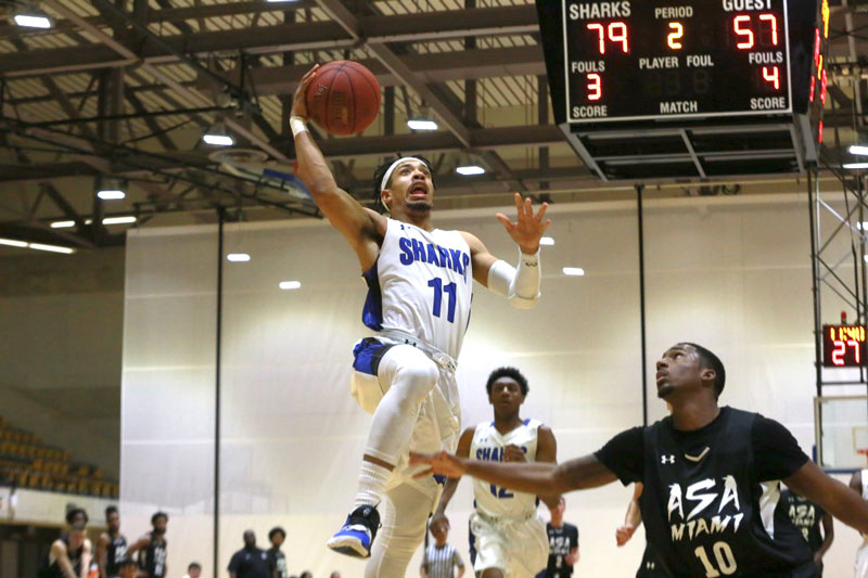 Montese Blake about to make a basket.