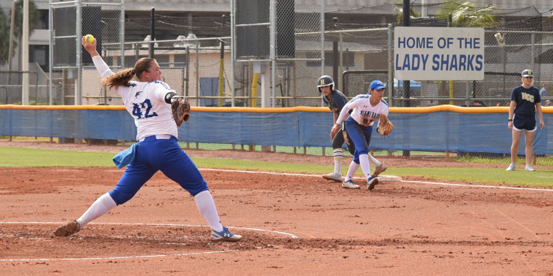 The Lady Sharks softball team during a game.