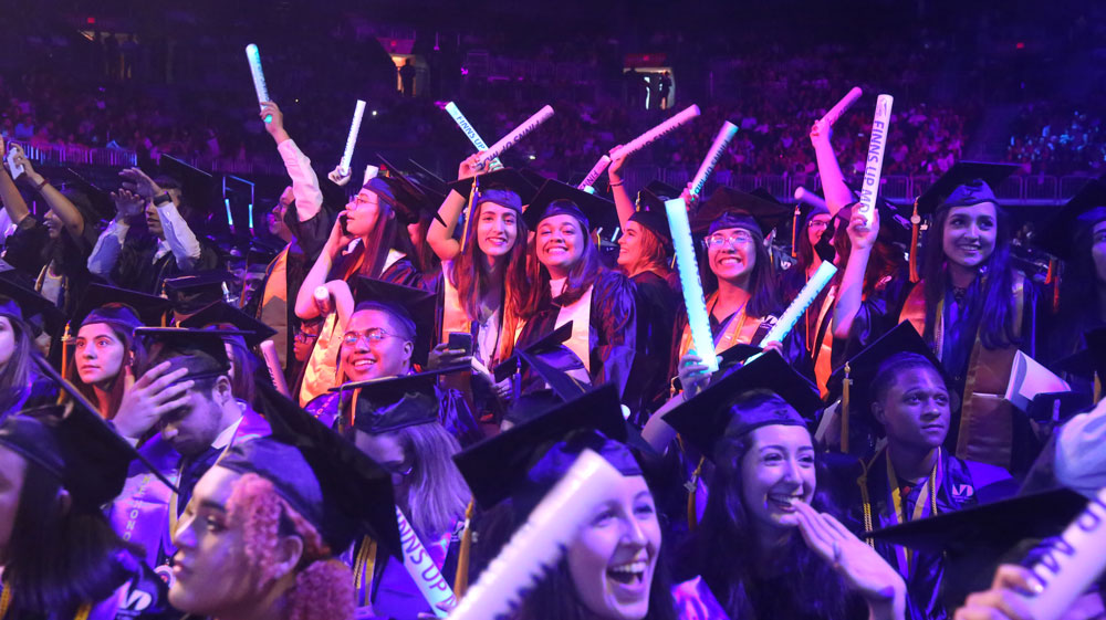 Students excited at commencement.