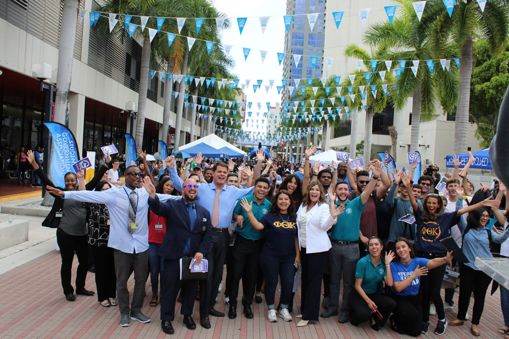 Faculty, staff and students posing for a picture.