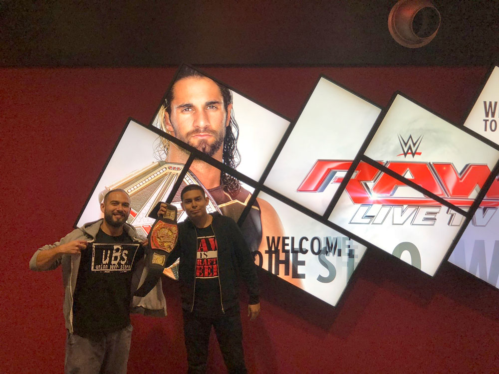 Photo of Bryan Lopez and his brother David at a wrestling show.