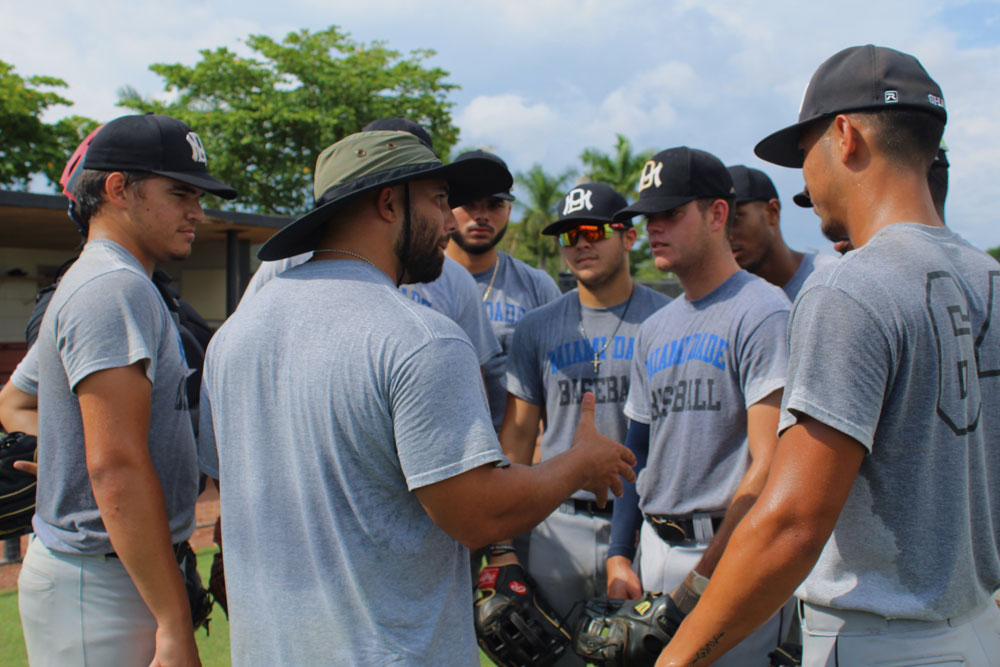 Adrian Morales talking to the players.