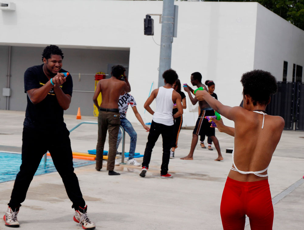 Students having a water gun fight.