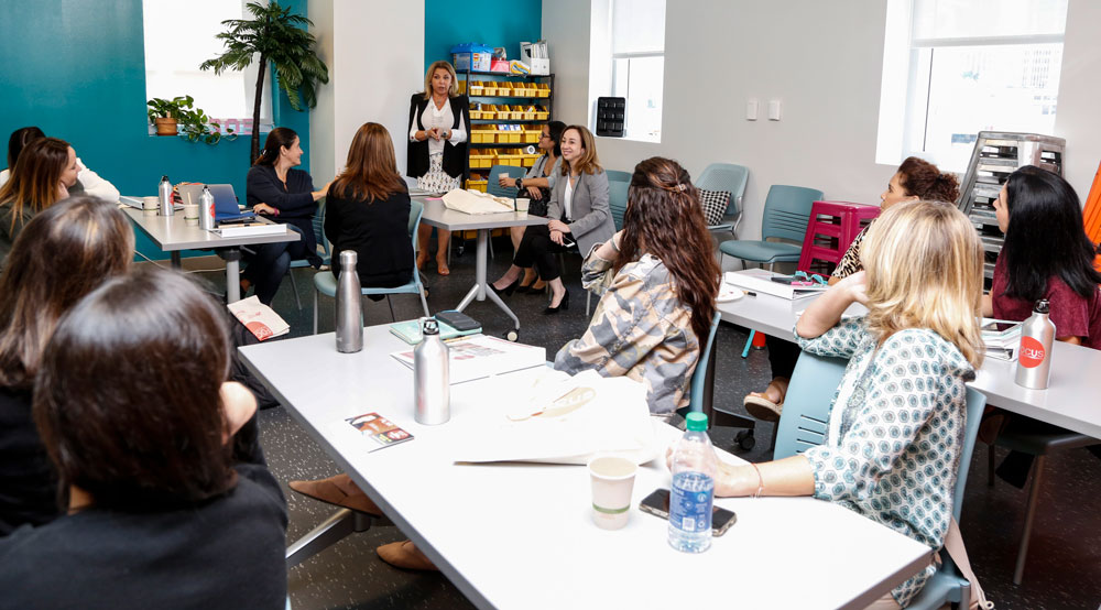 Female Venezuelan students having a discussion.