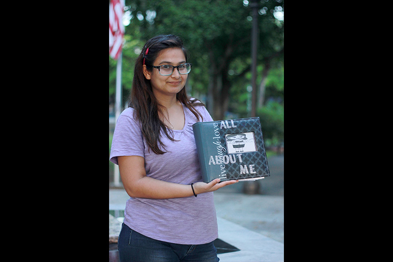 Melanie Young with her children's book.