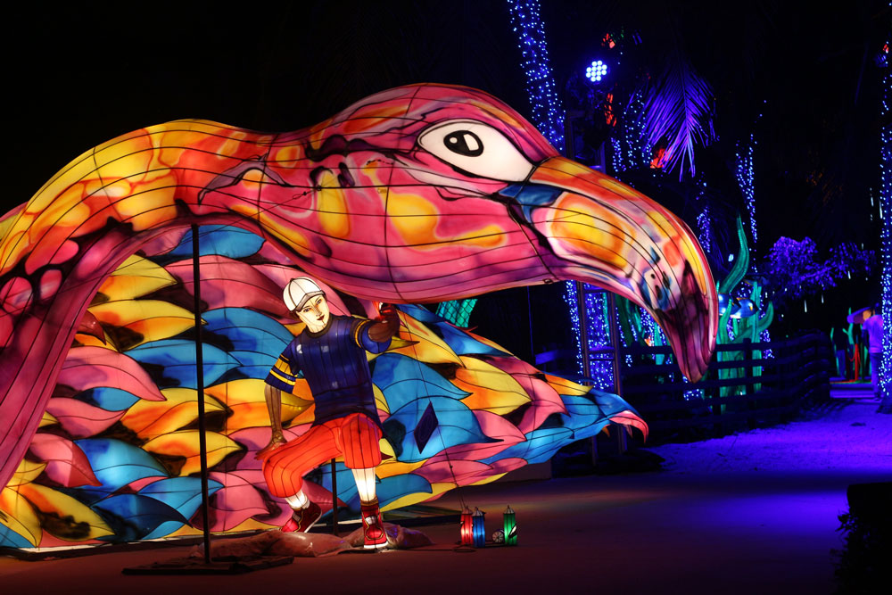 A lighted up flamingo lantern.