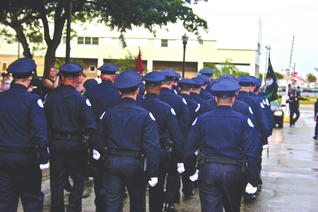 Police academy students marching to their graduation.