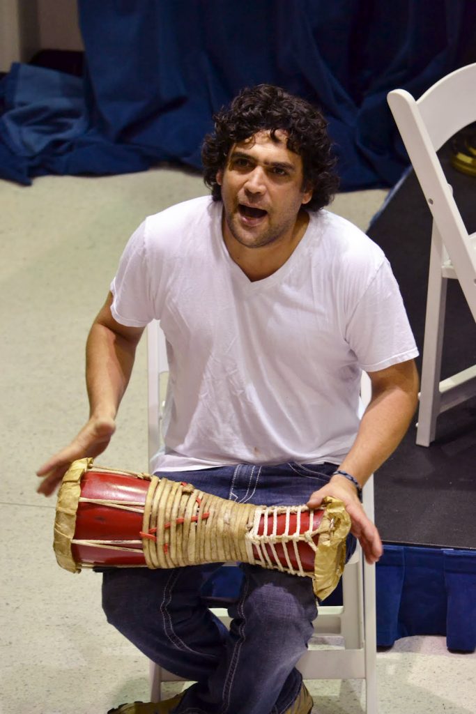 Daniel Chavarria playing the bongos.