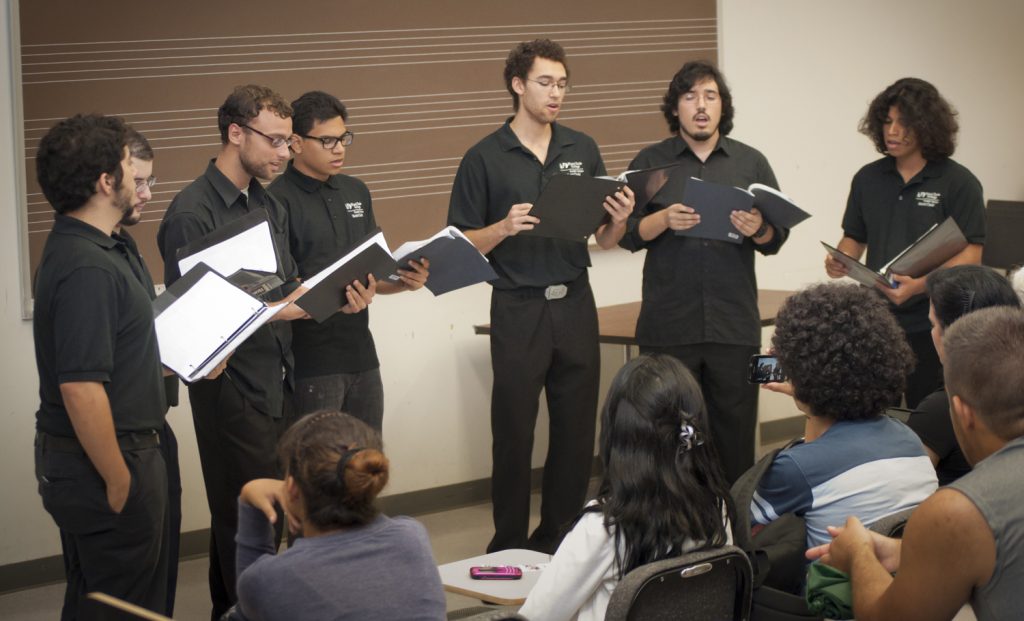 Men's choir performing at Kendall Campus.