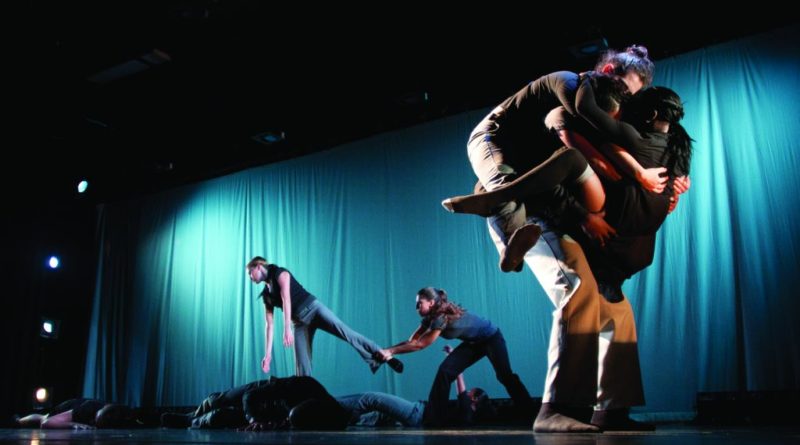Student dancers performing on stage.