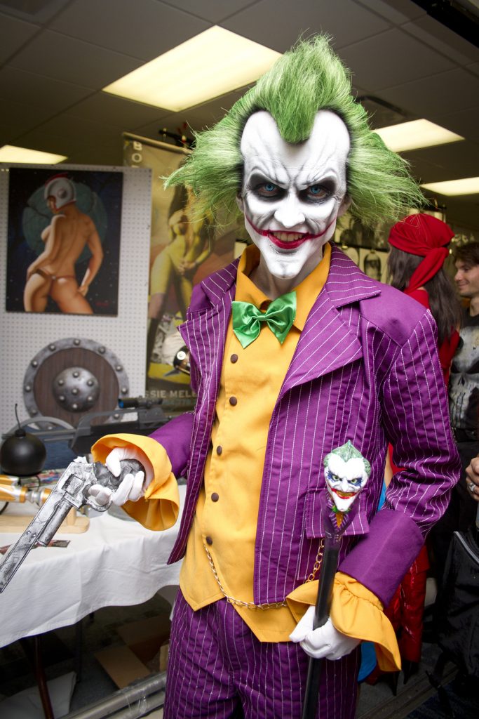 An attendee dressed as DC Comics' The Joker.