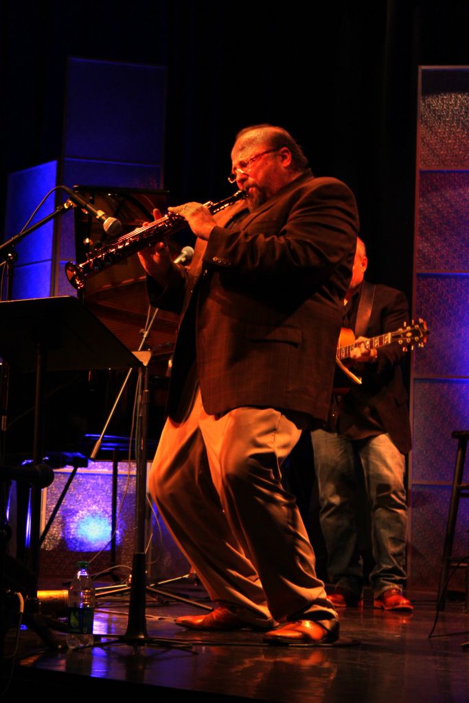 Ed Calle performing on stage.