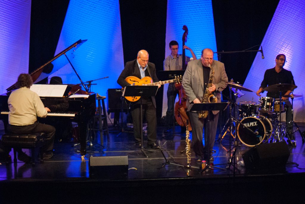 A jazz quintet made up of faculty performing at Kendall Campus.