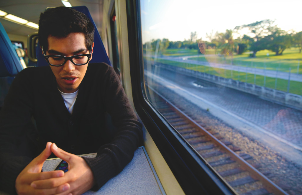 Photo of Brayan Vasquez taking the train.