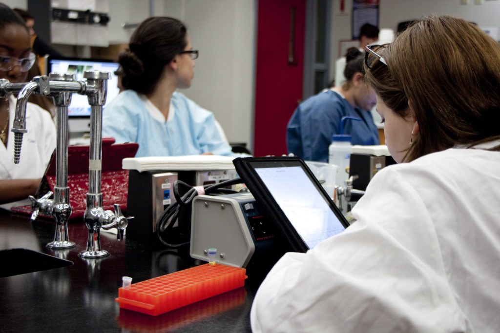 Photo of student with an ipad