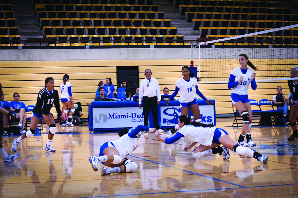 Lady Sharks volleyball team during match.