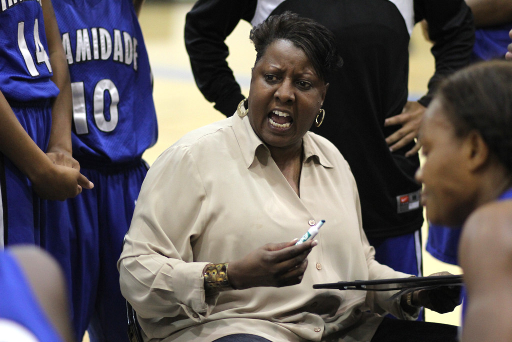 Coach Susan Summons talking to the players.