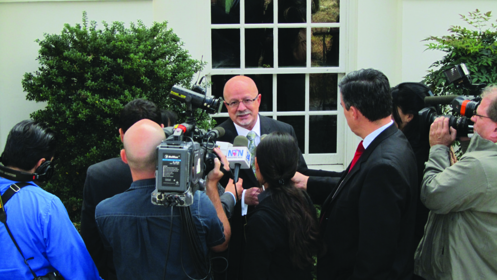 MDC President Dr. Padron speaking with reporters.