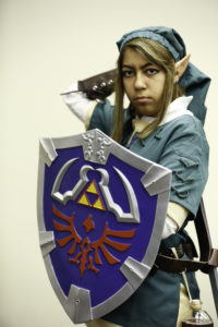 Cosplayer dressed as Link from The Legend of Zelda.