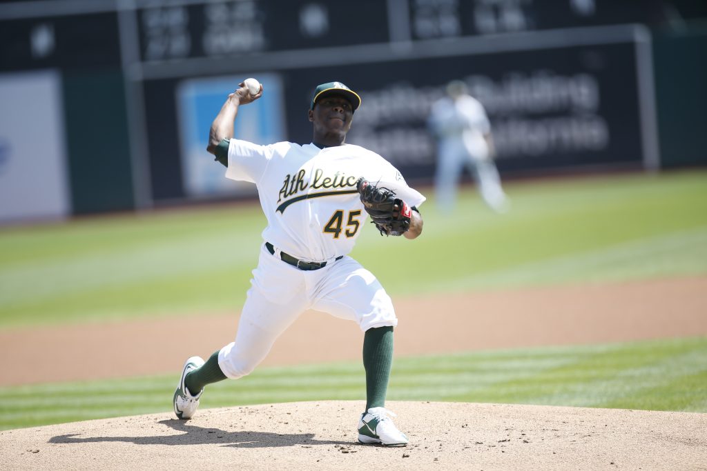 Photo of Jharel Cotton pitching for the baseball team Oakland As.